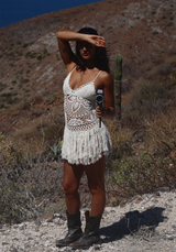 Close-up of Luca Dress statement crochet motif and fringe detailing