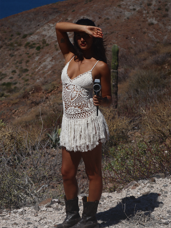 Close-up of Luca Dress statement crochet motif and fringe detailing