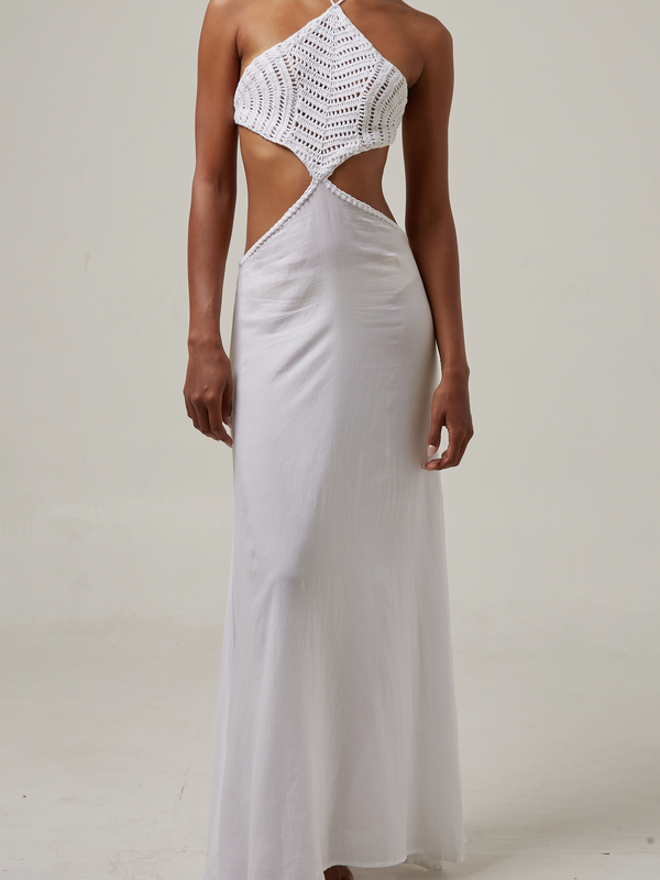 akoiaswim White dress with cut-out design on a plain background